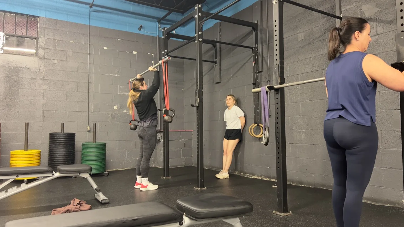 Vickery Athletics coaches and members training in the Dallas gym