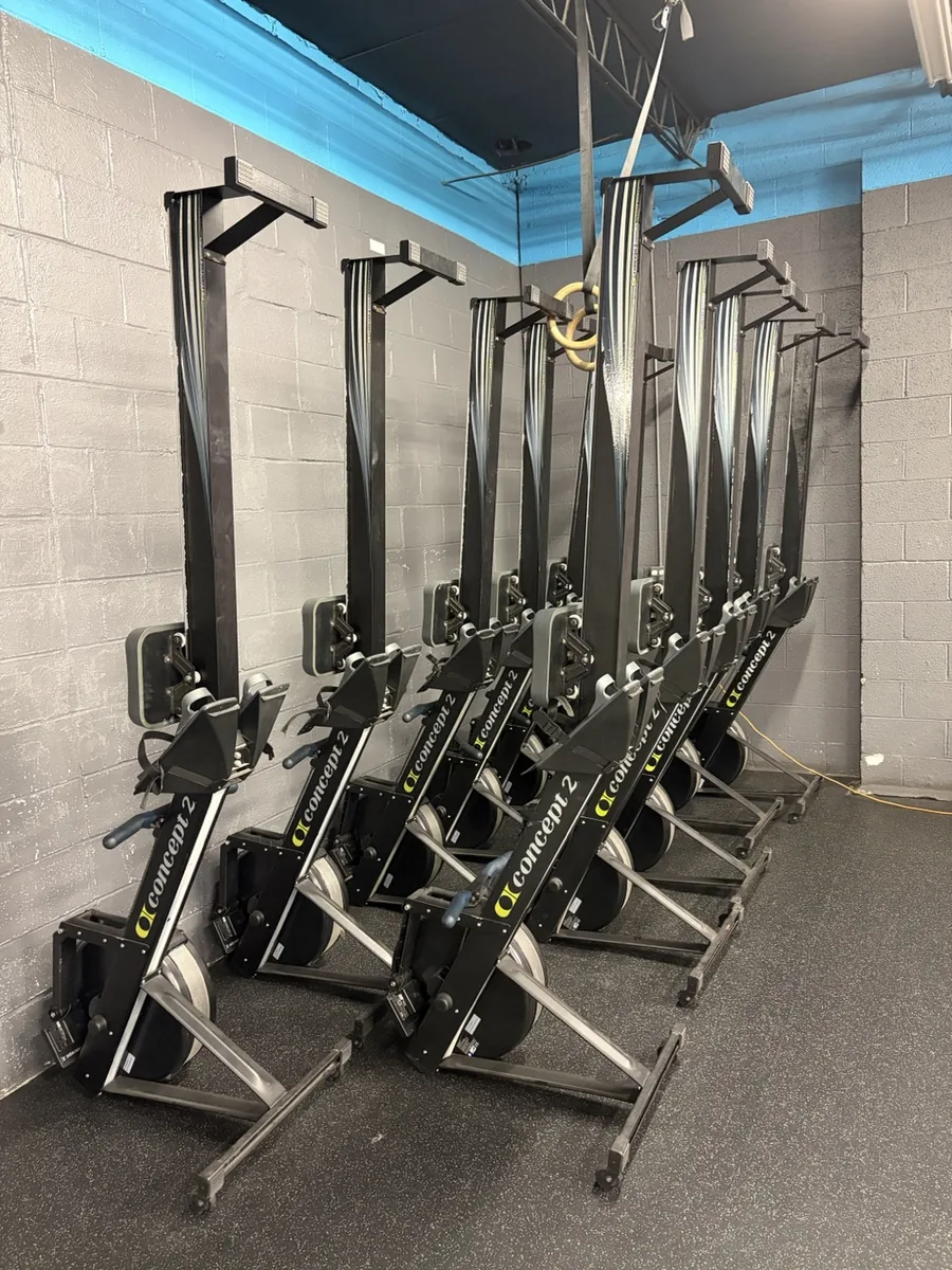 Barbell and bumper plate storage rack at Vickery Athletics strength gym in East Dallas